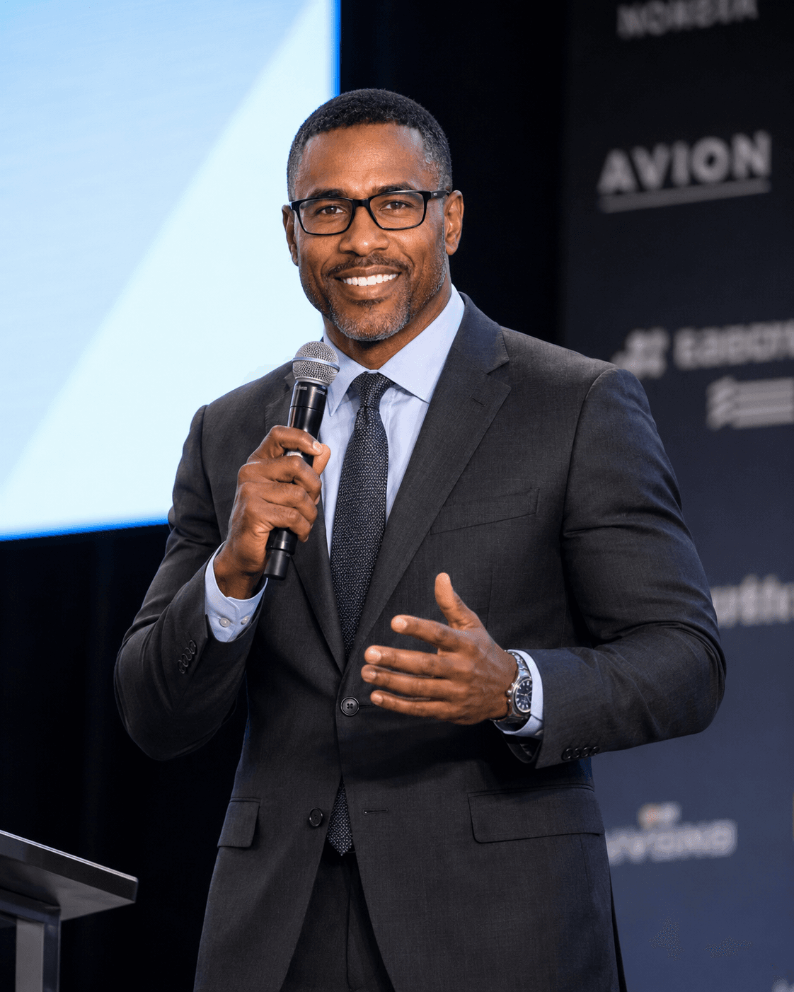 Solomon Price speaking at a business leadership event